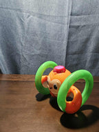 Bright Starts Roll & Glow Monkey | Musical Light Up Crawl Toy | Tummy Time Toy