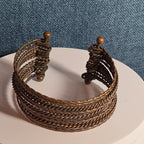 Brassy Color Dingle Hingled Bracelet Unmarked  14 Layers Dingle Together