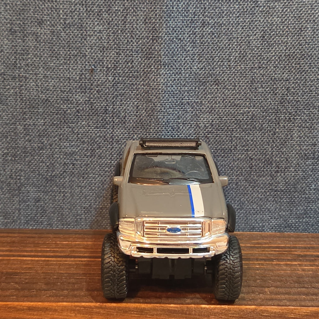 First Gear Custom Ford F-250 Lifted Peak Suspension Diecast Off-Road
