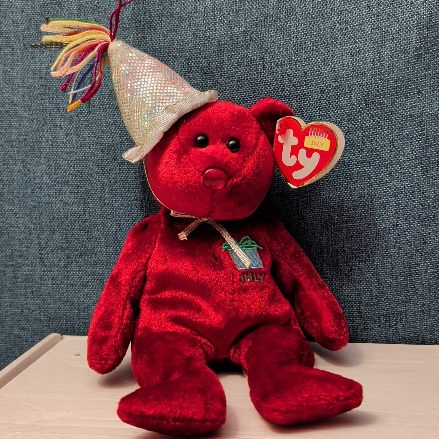 ​Ty Beanie Baby JULY Birthday Bear 2002 Red Teddy Silver Party Hat with Tag