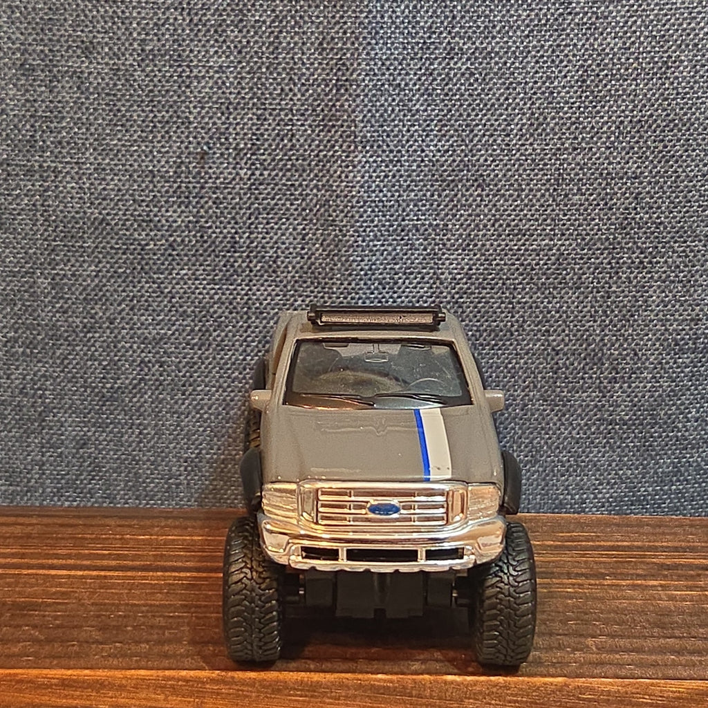 First Gear Custom Ford F-250 Lifted Peak Suspension Diecast Off-Road