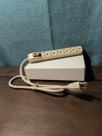 6-Outlet Power Strip Surge Protector 4 Ft Cord 15A Circuit Breaker Switch White