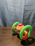 Bright Starts Roll & Glow Monkey | Musical Light Up Crawl Toy | Tummy Time Toy
