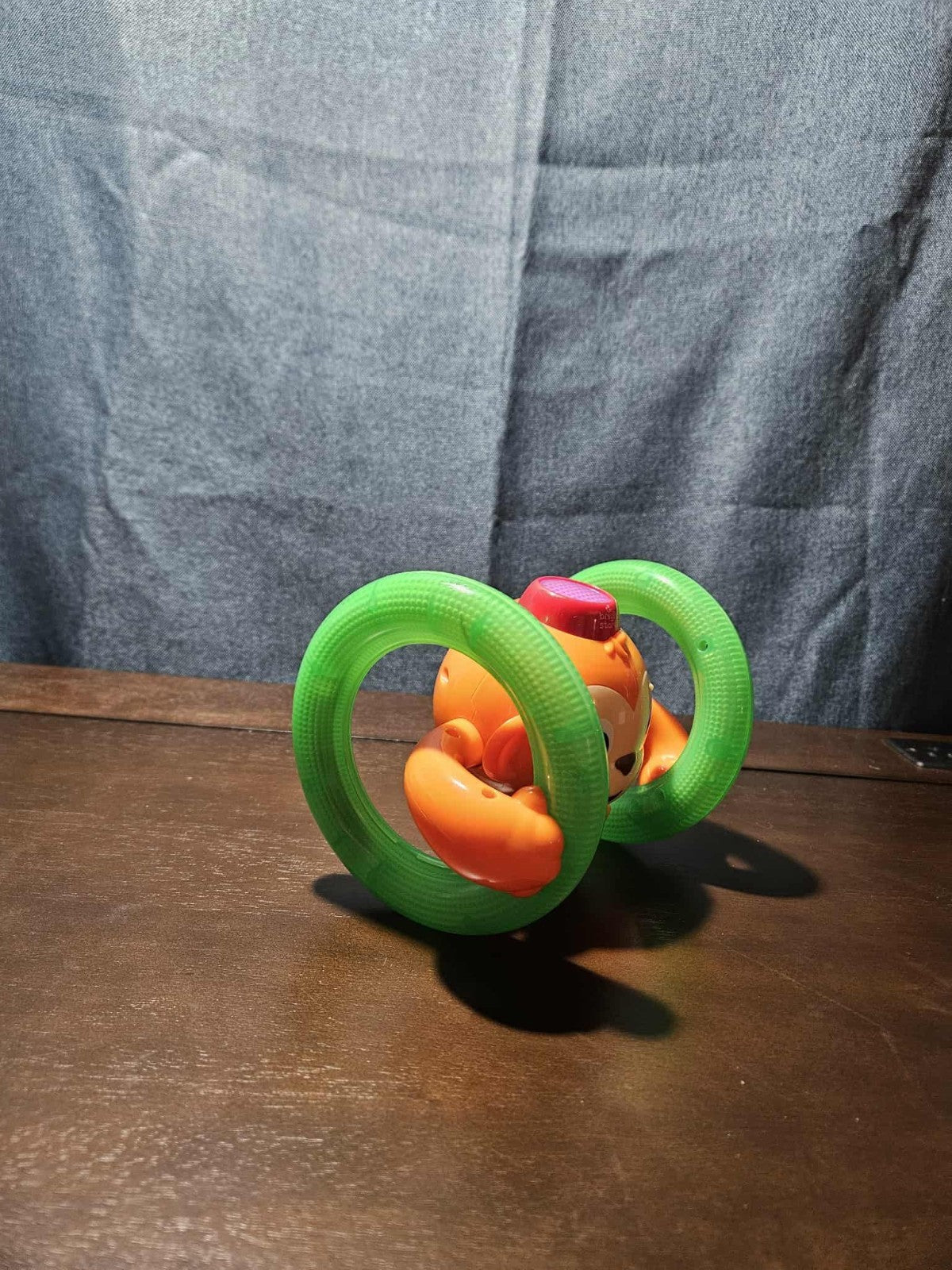 Bright Starts Roll & Glow Monkey | Musical Light Up Crawl Toy | Tummy Time Toy