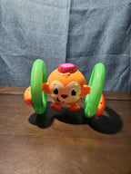 Bright Starts Roll & Glow Monkey | Musical Light Up Crawl Toy | Tummy Time Toy