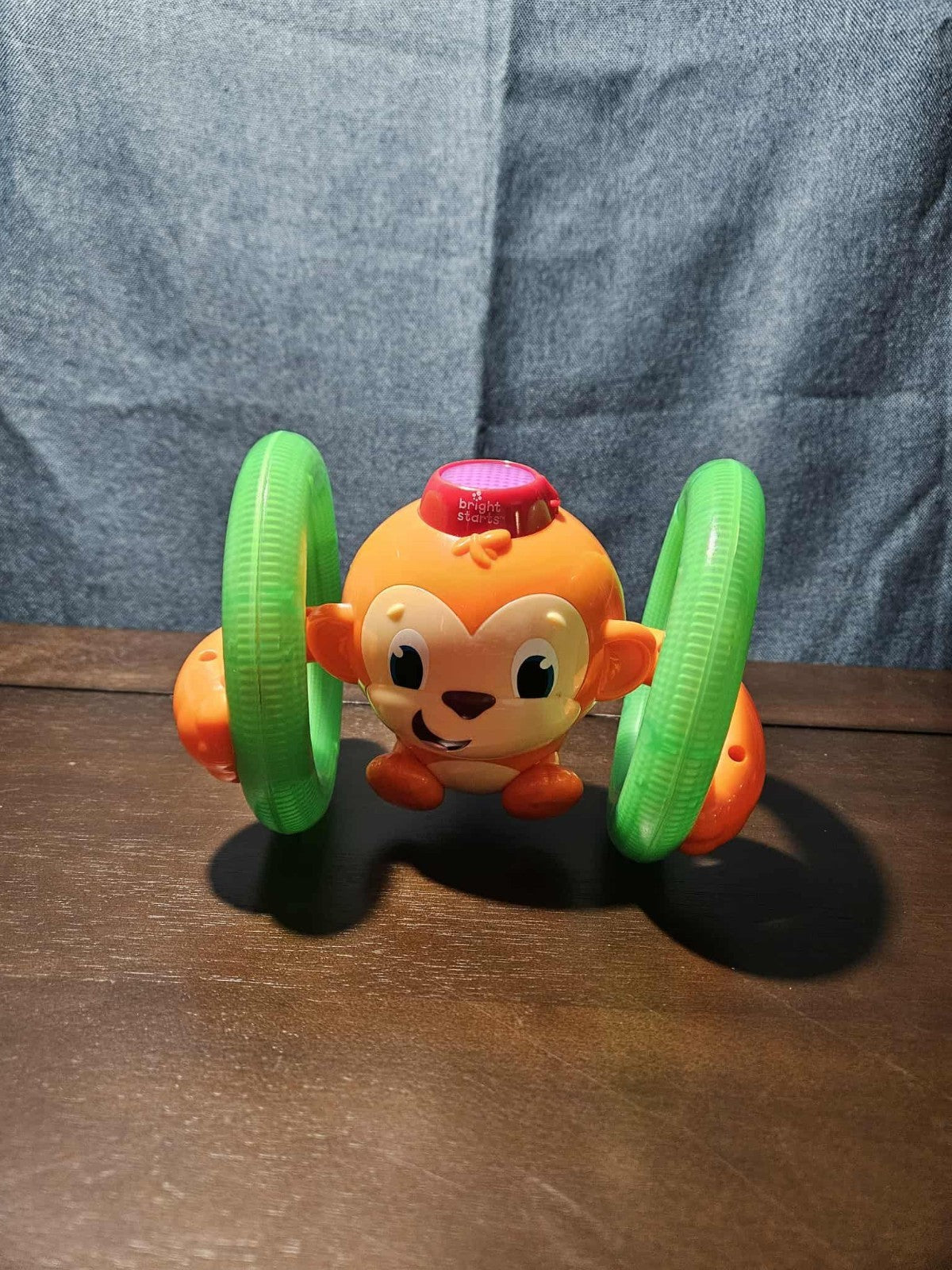 Bright Starts Roll & Glow Monkey | Musical Light Up Crawl Toy | Tummy Time Toy
