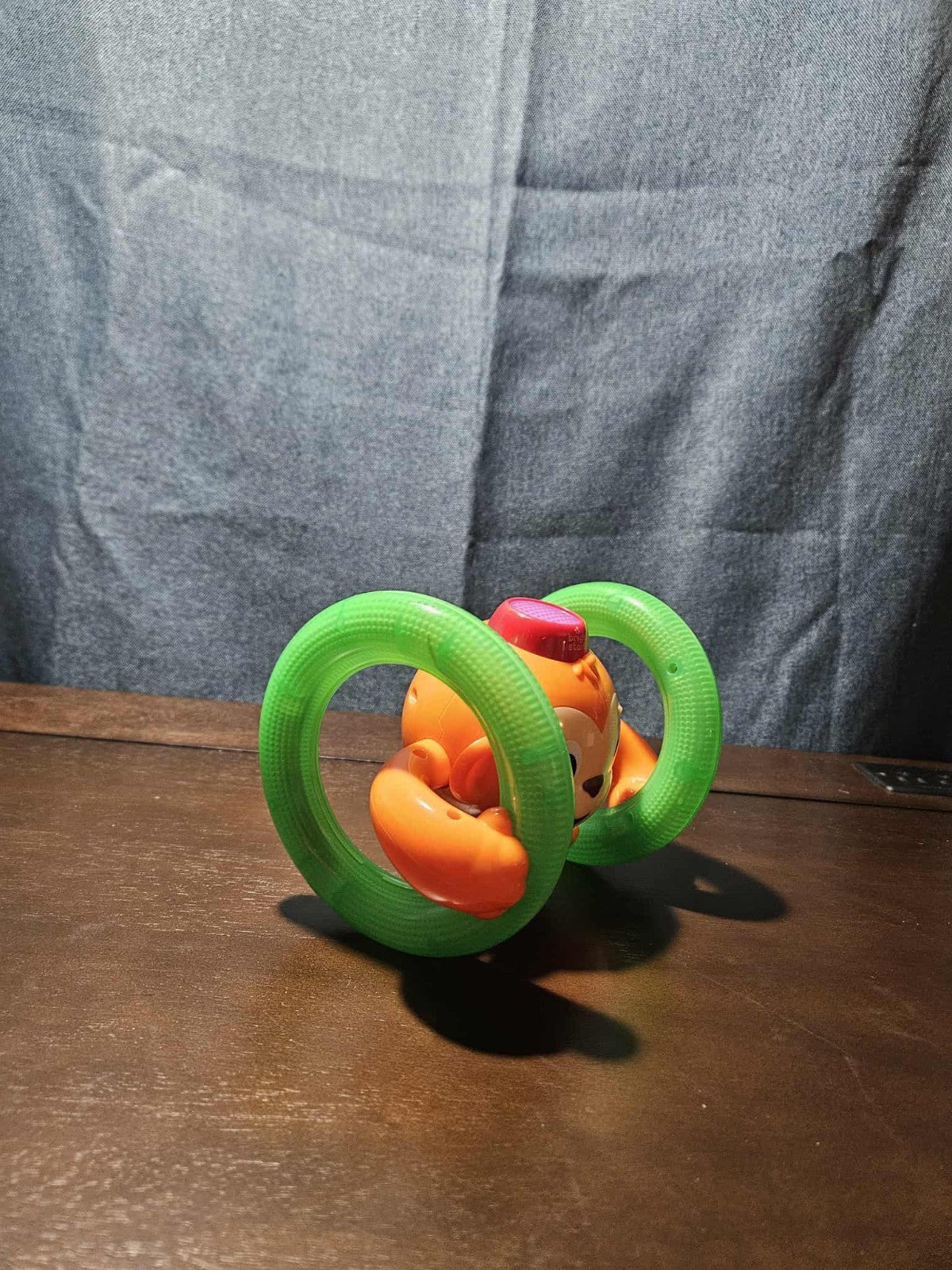 Bright Starts Roll & Glow Monkey | Musical Light Up Crawl Toy | Tummy Time Toy