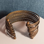 Brassy Color Dingle Hingled Bracelet Unmarked  14 Layers Dingle Together