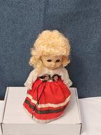 Vintage Heritage Doll Piggy Bank European Folk Costume Blonde Curls Aged Charm