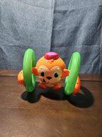 Bright Starts Roll & Glow Monkey | Musical Light Up Crawl Toy | Tummy Time Toy