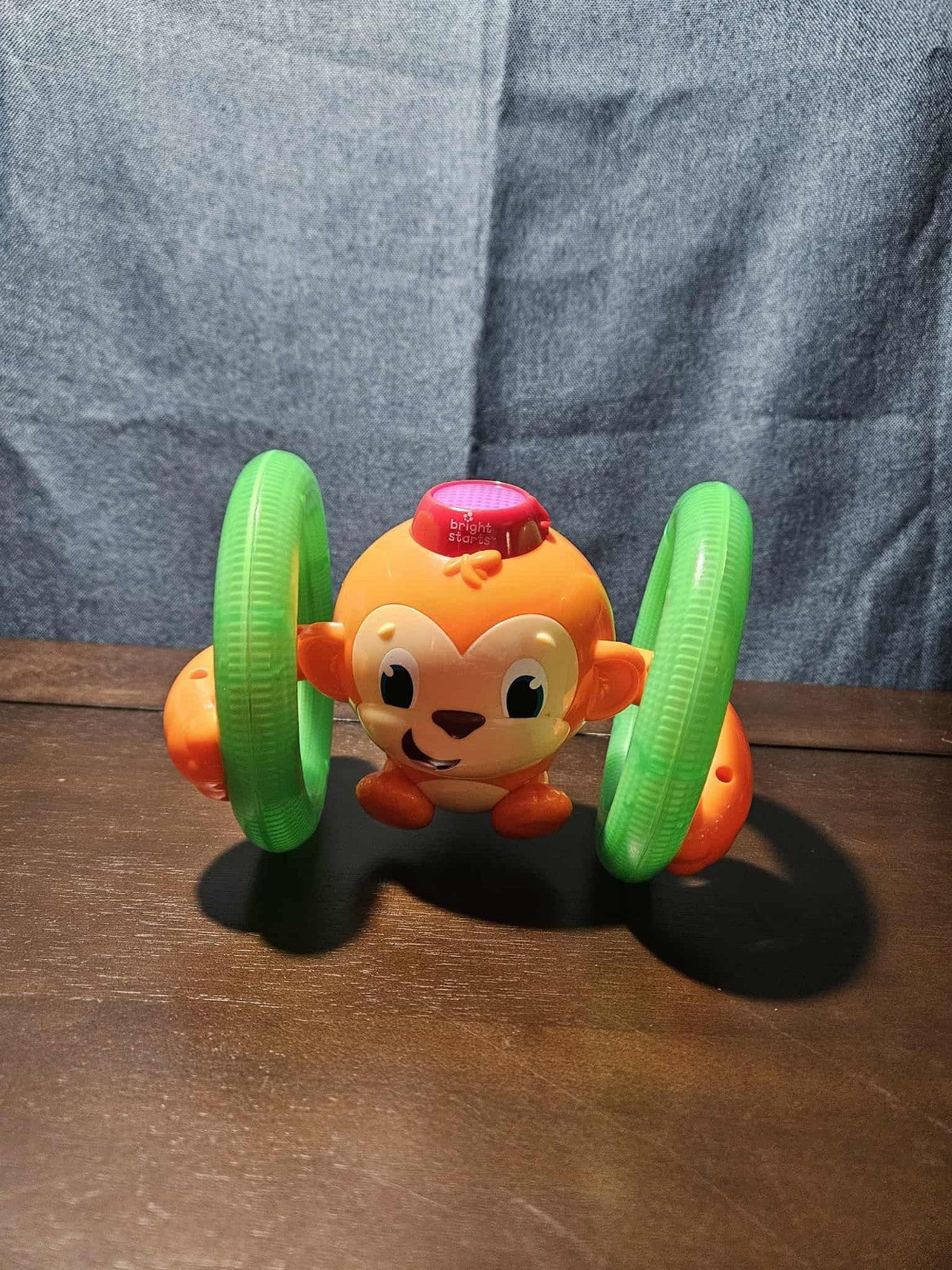 Bright Starts Roll & Glow Monkey | Musical Light Up Crawl Toy | Tummy Time Toy