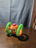 Bright Starts Roll & Glow Monkey | Musical Light Up Crawl Toy | Tummy Time Toy