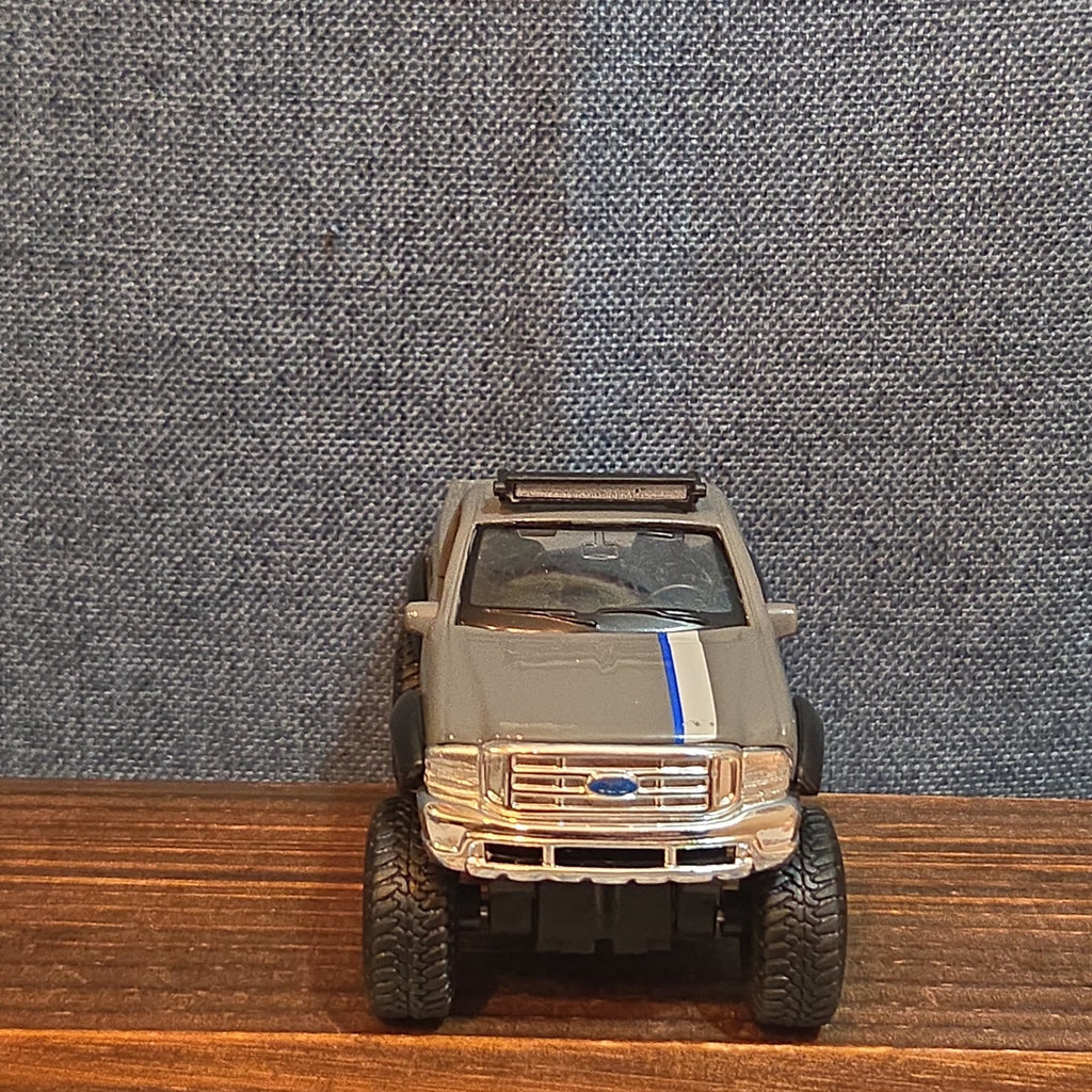 First Gear Custom Ford F-250 Lifted Peak Suspension Diecast Off-Road