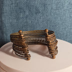 Brassy Color Dingle Hingled Bracelet Unmarked  14 Layers Dingle Together