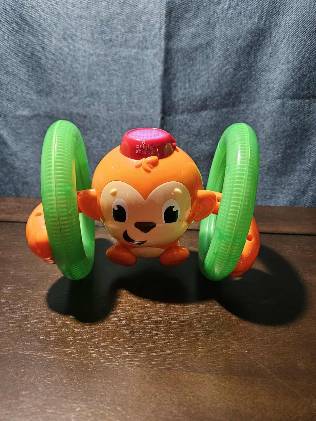 Bright Starts Roll & Glow Monkey | Musical Light Up Crawl Toy | Tummy Time Toy