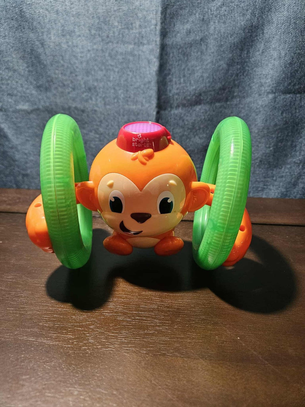 Bright Starts Roll & Glow Monkey | Musical Light Up Crawl Toy | Tummy Time Toy