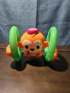 Bright Starts Roll & Glow Monkey | Musical Light Up Crawl Toy | Tummy Time Toy