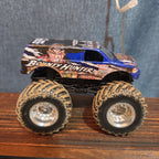Hot Wheels Monster Jam Bounty Hunter Mud Treads Diecast 2012