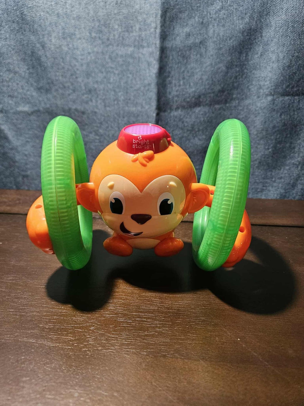Bright Starts Roll & Glow Monkey | Musical Light Up Crawl Toy | Tummy Time Toy